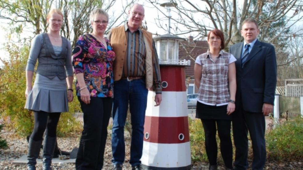 Im Zeichen des Leuchtturms: Das Familienunternehmen Korte mit Tochter Sandra (links), Anja Korte-Duismann, Ralf Korte, Tochter Karin und Bürgermeister Gerald Sap. © Foto: Hoegen