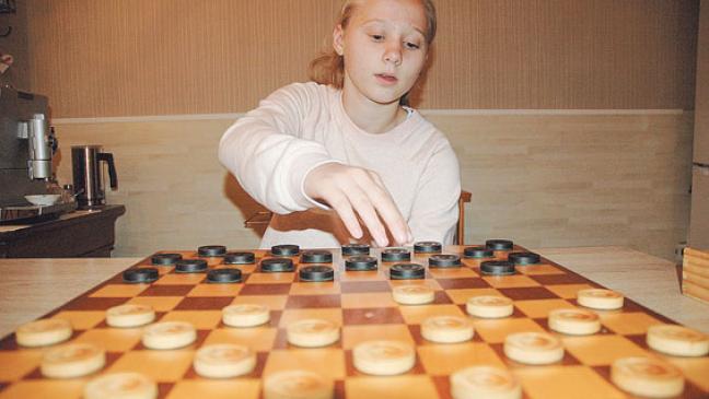 Dame-Spielerin in aller Herren Länder