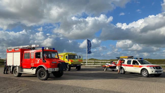 Familie auf Norderney vom Wasser überrascht