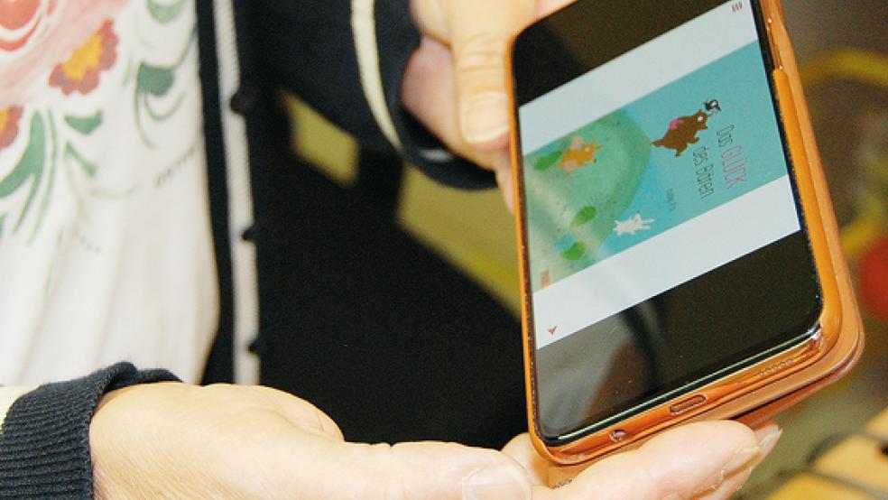 Auf dem Smartphone, aber auch auf dem Tablet, lassen sich mit der »Tigerbook«-App Kinderbücher lesen.  © Foto: Hoegen