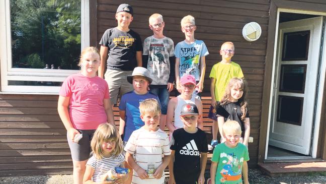 Kinder lernen das Angeln kennen